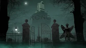 The gate to Kong Studios. The sky is dark blue, and the gate is black, tall, and says 'Kong' at the top. There are gravestones around and a statue of Pazuzu.